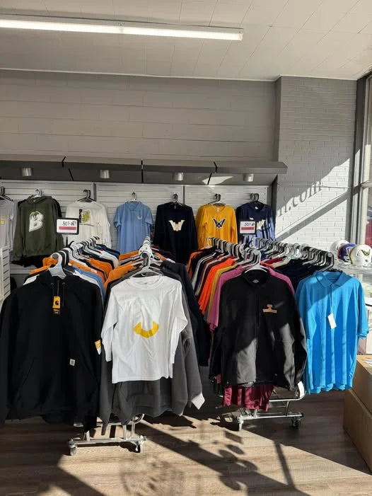 Custom apparel on display inside the Express Screen Printing shop in Cleveland, Tennessee