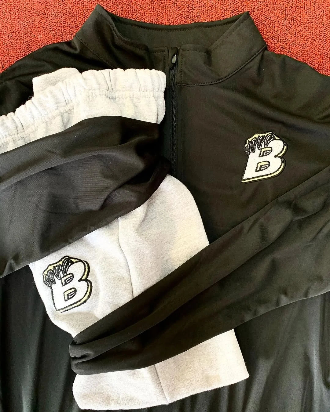 Embroidered black and grey apparel