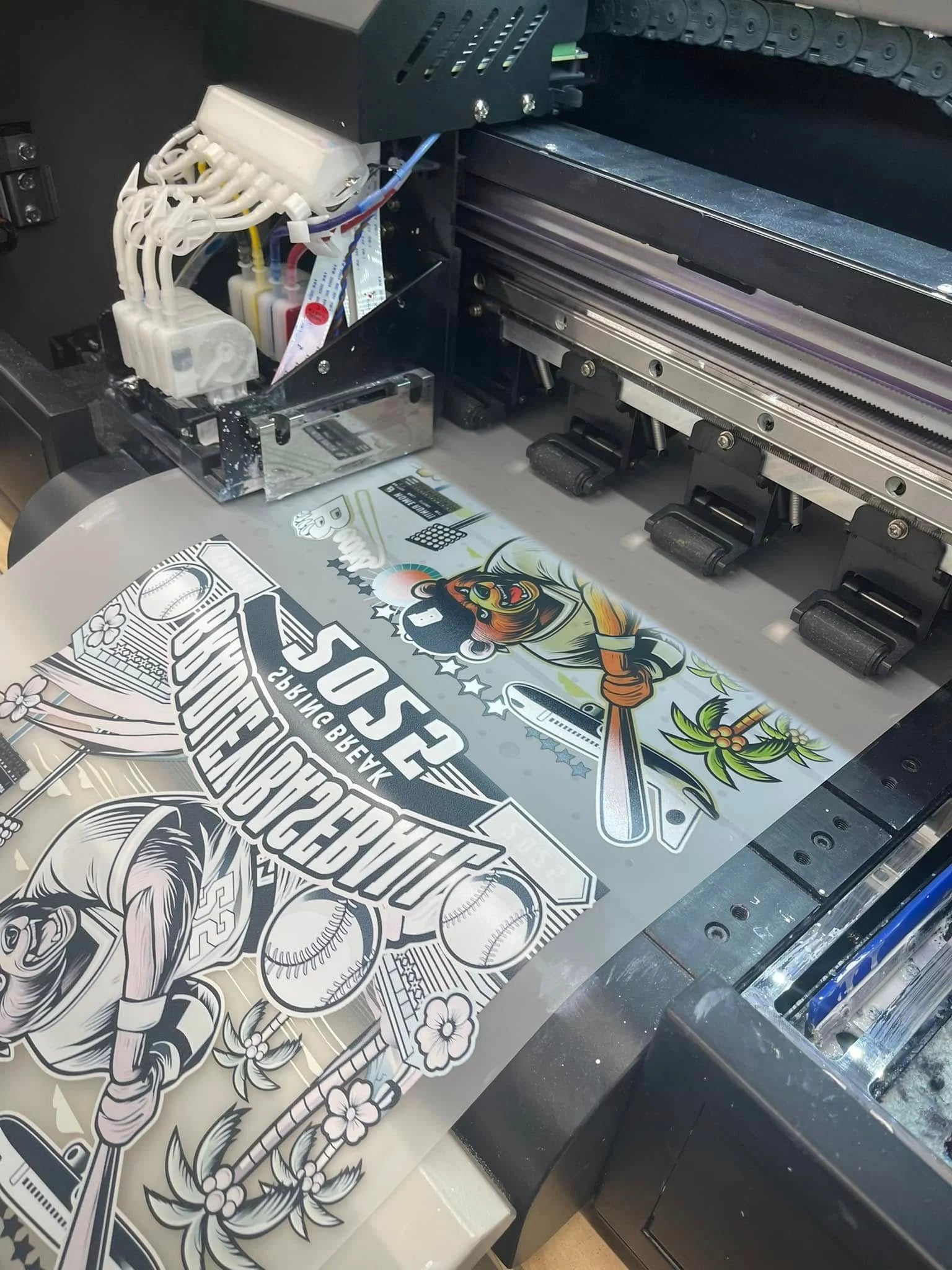 Screen printing press running at Express in Cleveland, TN