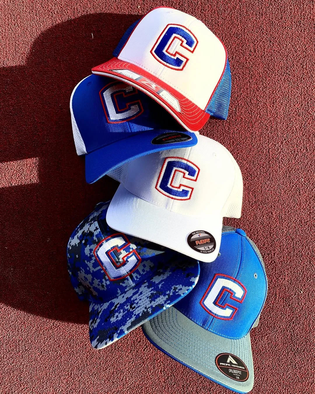 Stacked embroidered caps